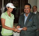 Ms. Neha Tripathi received her cheque