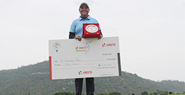 Winner Amandeep Drall with giant cheque & trophy