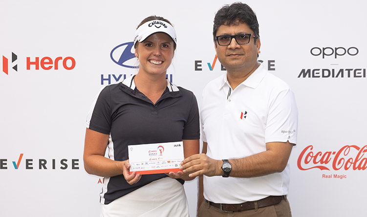 Sara Kjellker of Sweden receives her cheque for second place