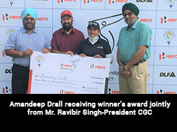 Amandeep Drall receiving winner's award jointly from Mr. Ravibir Singh-President CGC