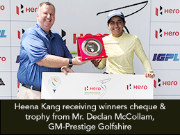 Heena Kang receiving winners cheque & trophy from Mr. Declan McCollam, GM-Prestige Golfshire