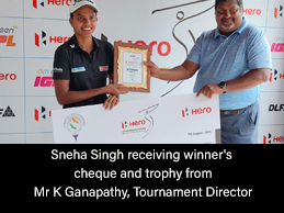 Sneha Singh receiving winner's cheque and trophy from Mr K Ganapathy, Tournament Director