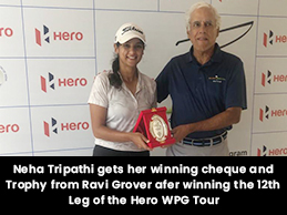 Neha Tripathi gets her winning cheque and Trophy from Ravi Grover afer winning the 12th Leg of theHero WPG Tour