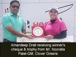 Amandeep Drall receiving winner's cheque & trophy from Mr. Nooralla Patel-GM, Clover Greens