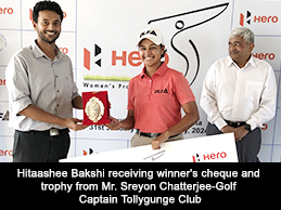 Hitaashee Bakshi receiving winner's cheque and trophy from Mr. Sreyon Chatterjee-Golf Captain Tollygunge Club