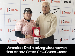 Amandeep Drall receiving winner's award from Mr. Ravi Grover, CEO-Golden Greens.