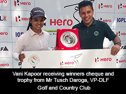 Vani Kapoor receiving winners cheque and trophy from Mr Tusch Daroga, VP-DLF Golf and Country Club