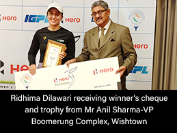 Ridhima Dilawari receiving winner's cheque and trophy from Mr Anil Sharma-VP Boomerung Complex, Wishtown
