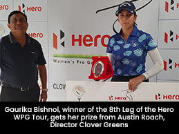 Gaurika Bishnoi, winner of the 8th Leg of the Hero WPG Tour, gets her prize from Austin Roach, Director Clover Greens