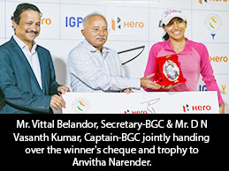Mr. Vittal Belandor, Secretary-BGC & Mr. D N Vasanth Kumar, Captain-BGC jointly handing over the winner's cheque and trophy to Anvitha Narender.